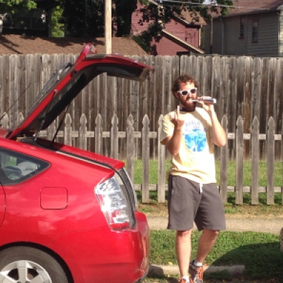 Devin the f#$%ing hipster, brushing his hipster teeth out of the back of his hipster Prius.